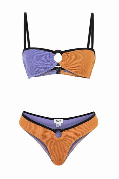 Minimalizmin Şıklığı: Kontrast Çizgili Mayo ve Bikini Trendleri