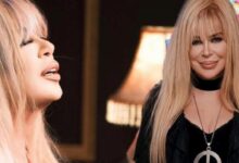 Side profile of a blonde woman on the left and a smiling blonde woman in black with a large circular pendant on the right.